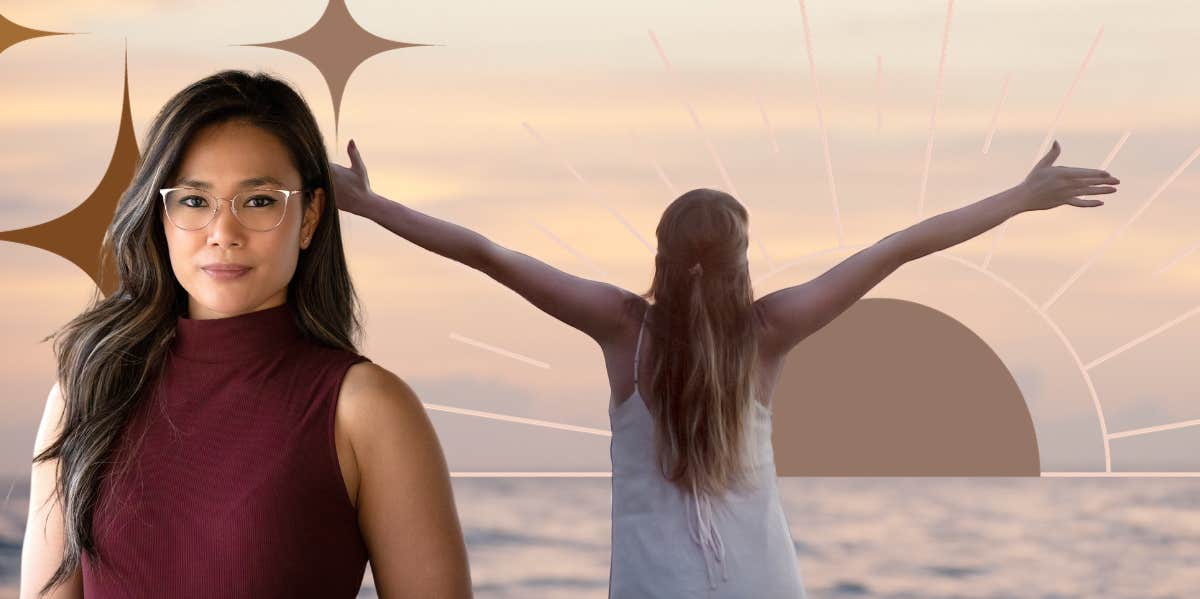 Woman with arms spread wide at beach