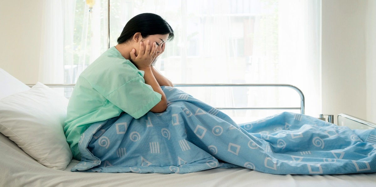 woman in hospital bed