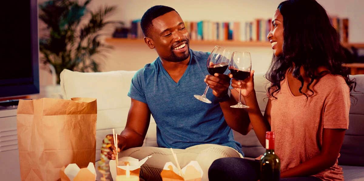 couple eating Chinese food at home on date night