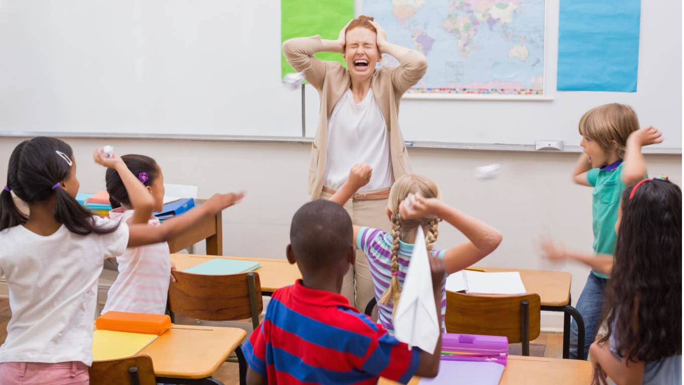 teacher struggling to teach misbehaved children