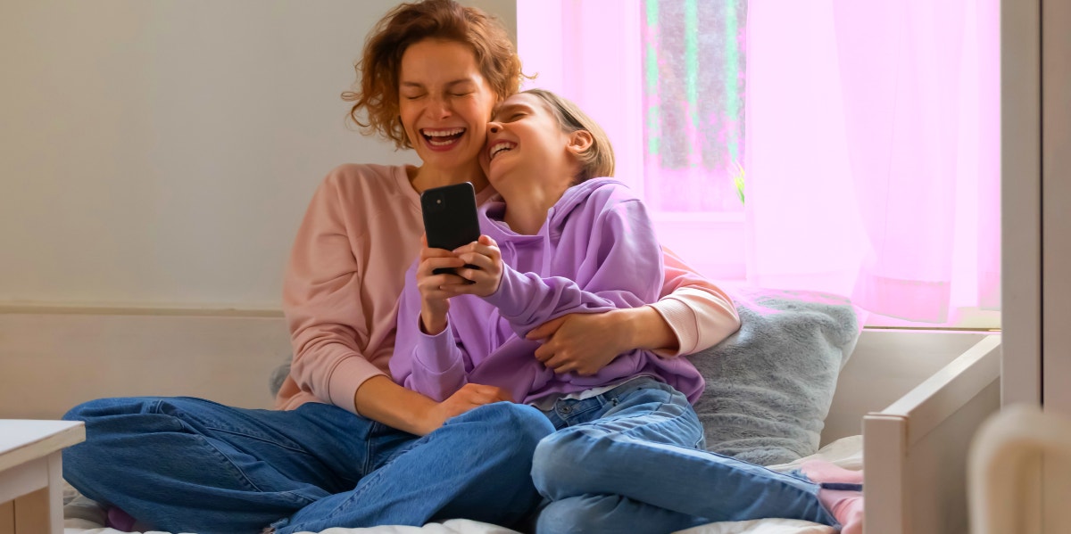 mother and daughter laughing together