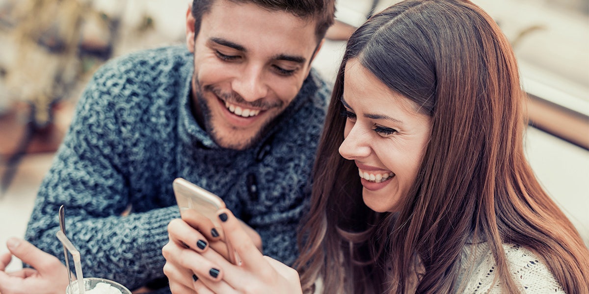 couple looking at the phone