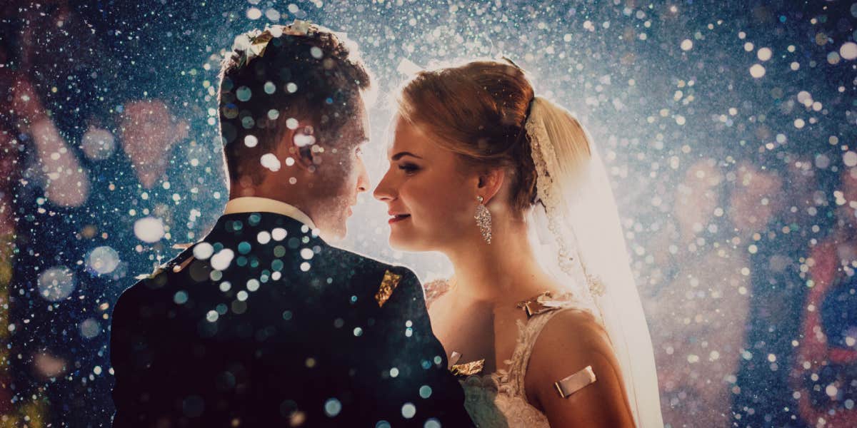 How marriage will change in the future white couple in their 20s in wedding clothes dancing in confetti