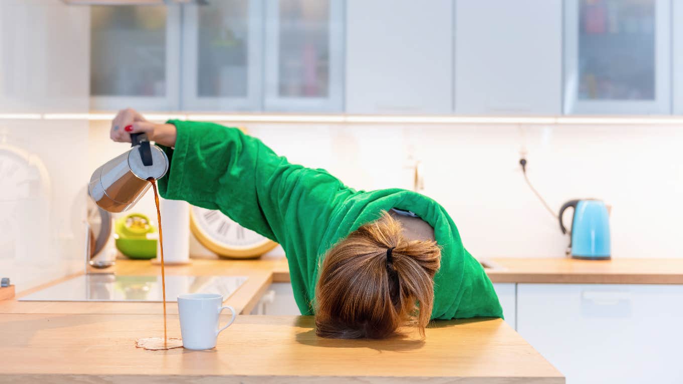 woman with head on counter pouring coffee missing cup