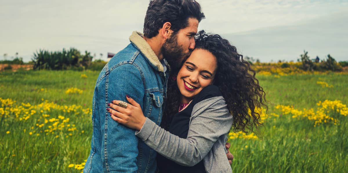 couple hugging outside