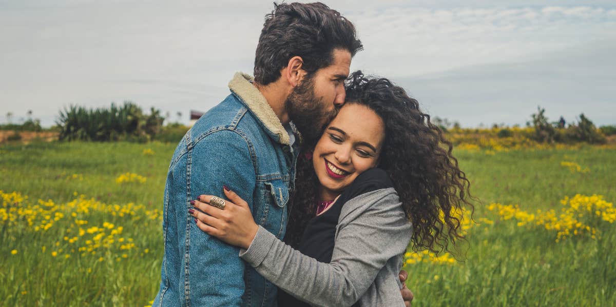 9 Genuinely Helpful Relationship Rules Happy Couples Follow happy couple smiling among flowers