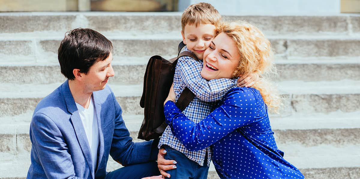 parents dropping son off at school