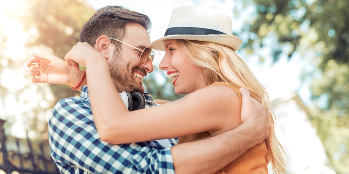 couple embracing hapiily