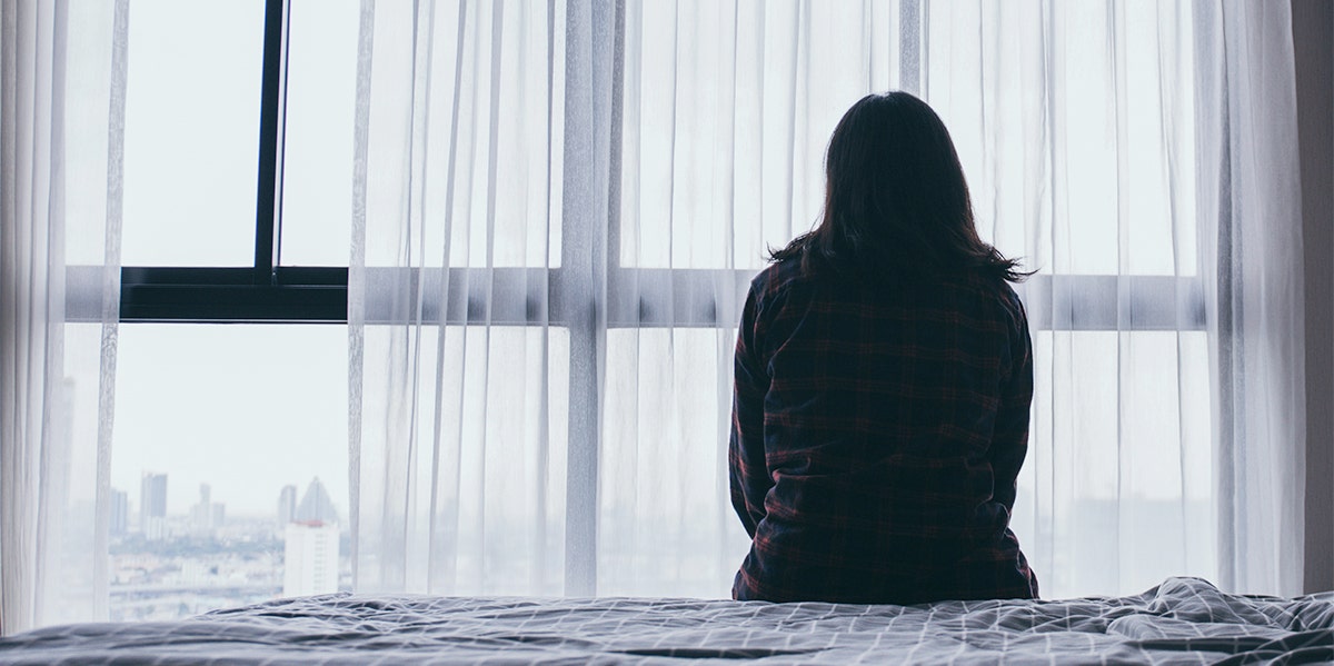 My Husband Ghosted Me — I Haven't Heard From Him In Months sad woman on bed