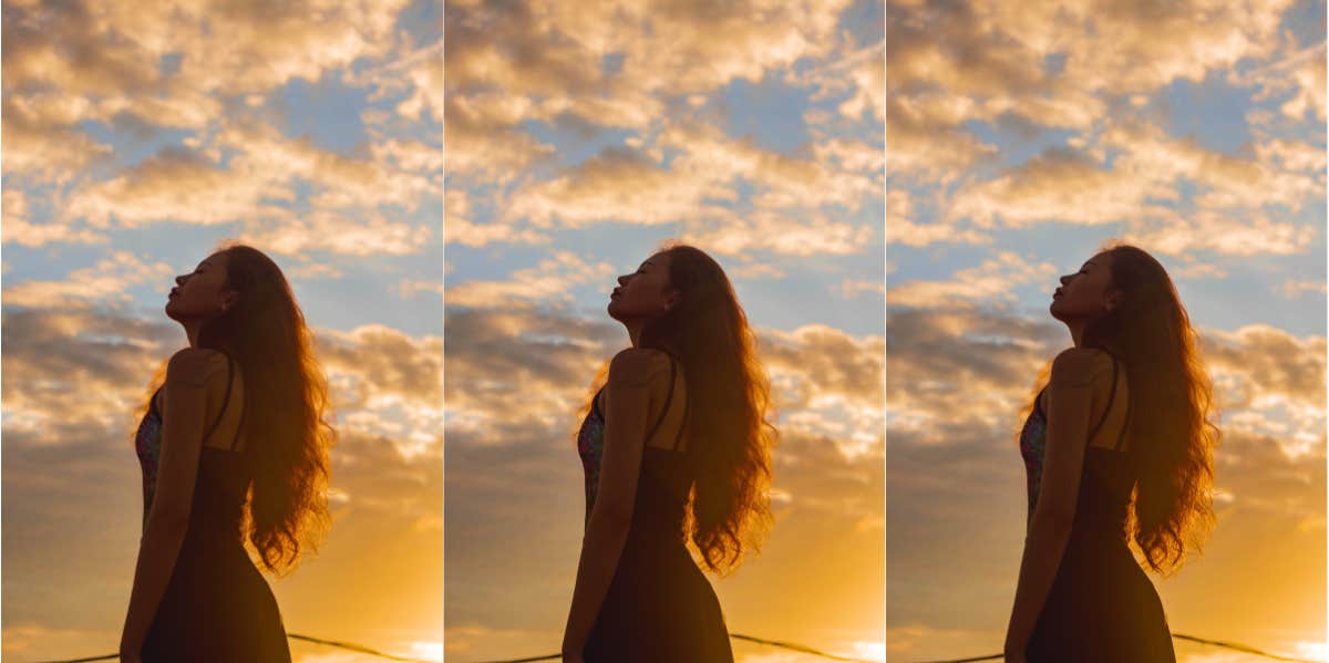I Was Never A Small Town Girl, I Was A Girl Stuck In A Small Town woman looking at the sky