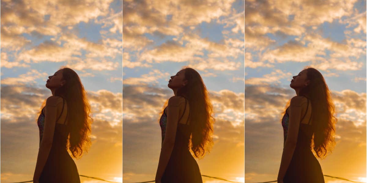 woman looking at the sky