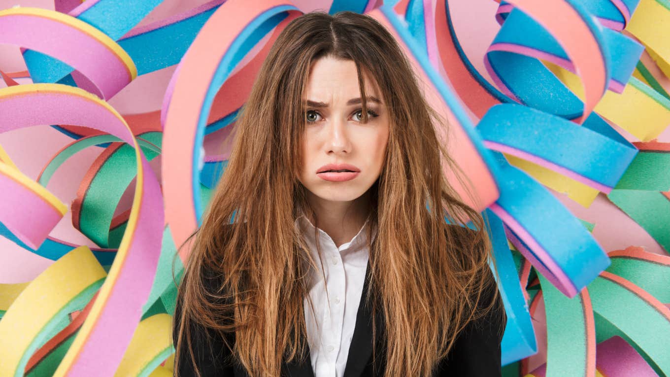 If You Recognize These 12 Red Flags, You're Giving Too Much Of Yourself To Others frustrated woman tired of giving too much of herself