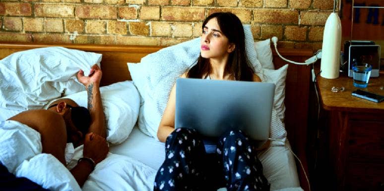 couple going to sleep at different times going to bed at different times