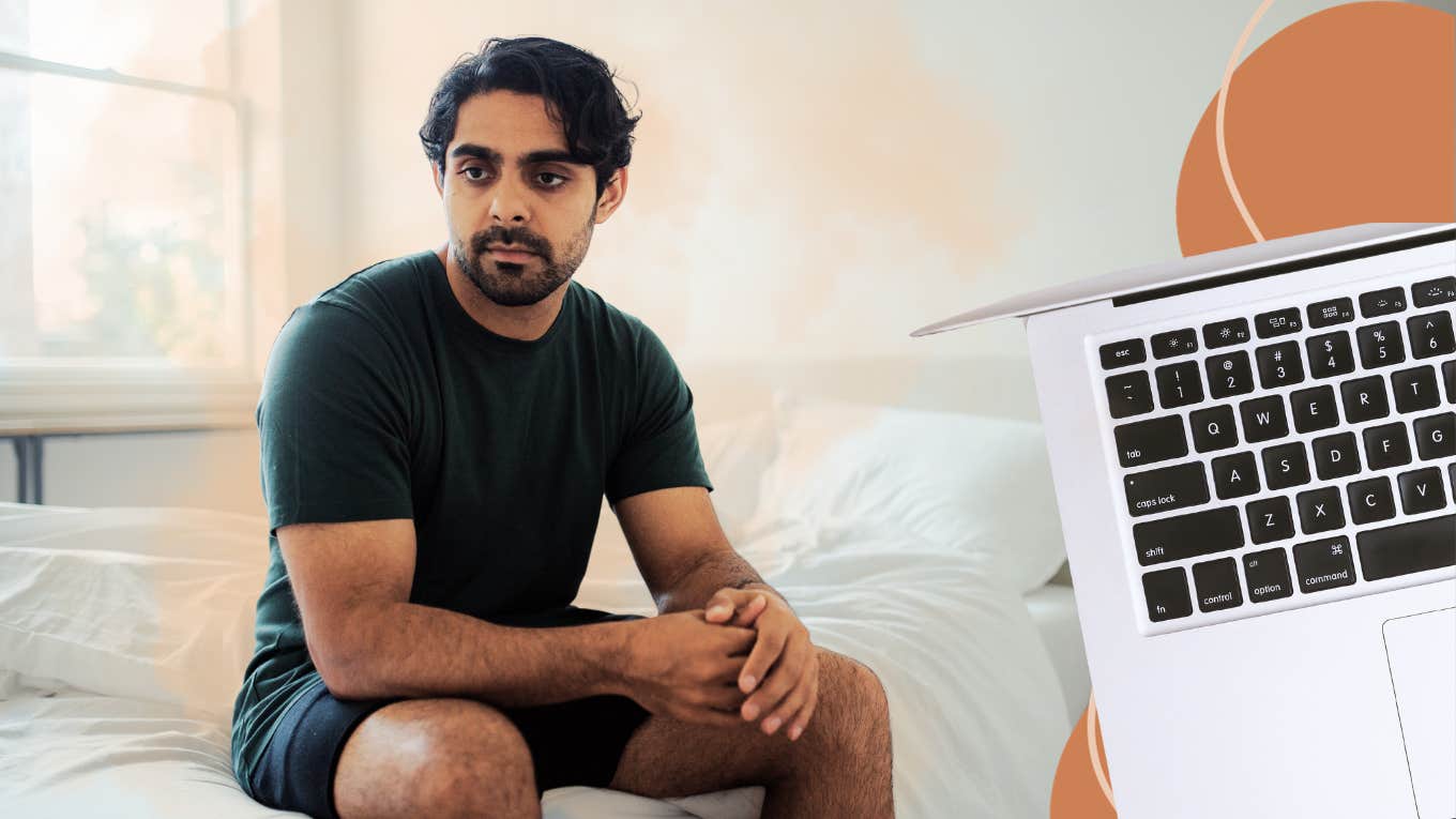 Man sitting on edge of bed, confused