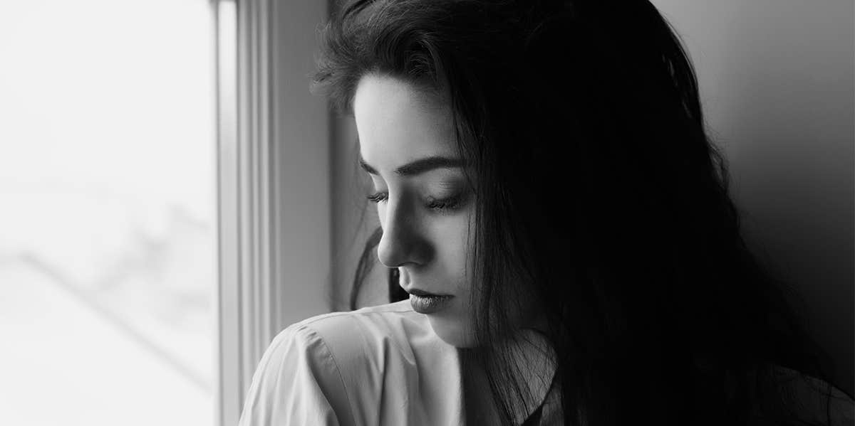 Goodbye Is So Much More Than Just A Word For Me sad woman by window