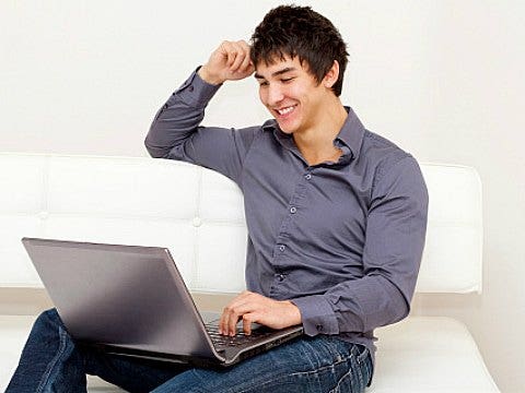 young guy with laptop computer