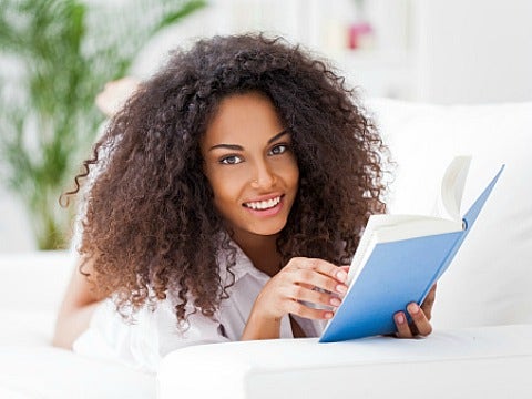 happy woman reading book