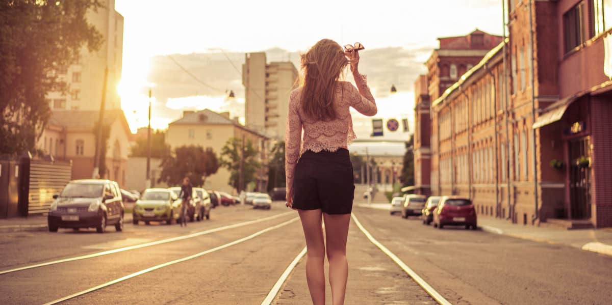 woman walking away