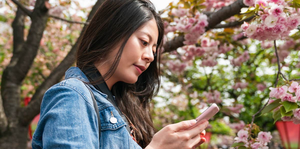 woman on phone in park