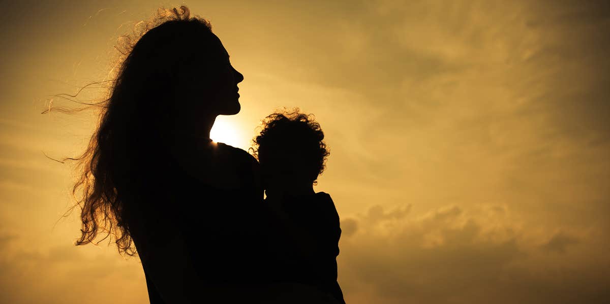 woman holding baby