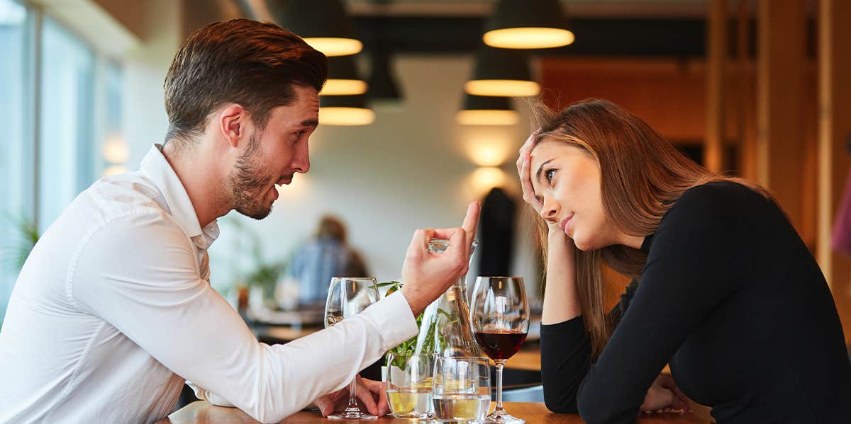 Why Having The 'Same Old Fight' Is A Sign You May Be Soulmates man and woman arguing at dinner