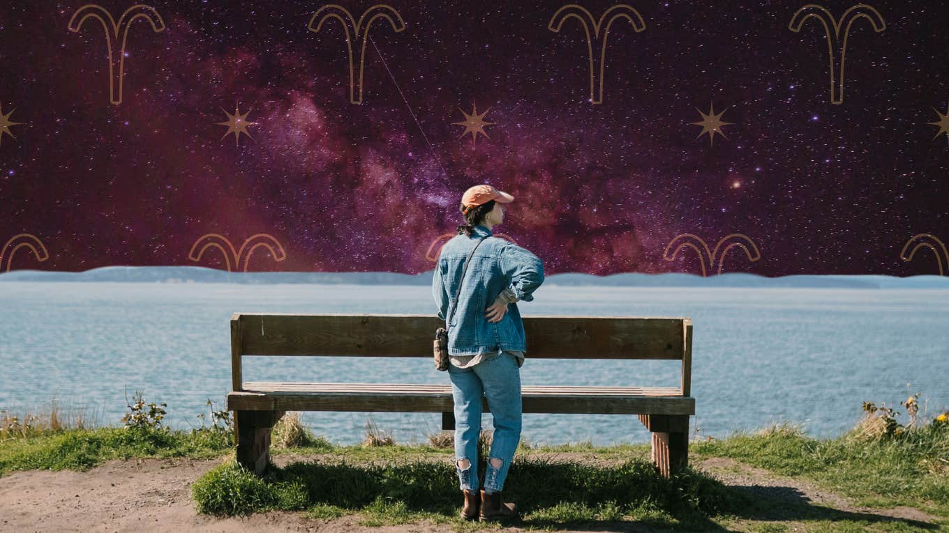 woman looking out into galaxy