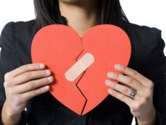 How Long Does It Take To Move On From A Breakup? woman with broken heart