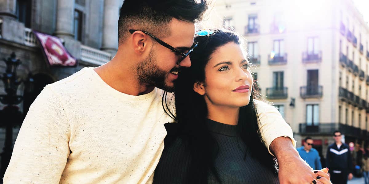 couple walking on a city street