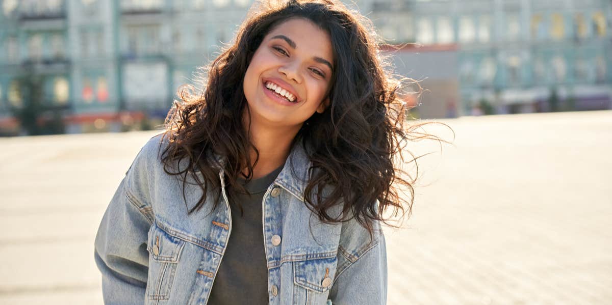 woman smiling outside