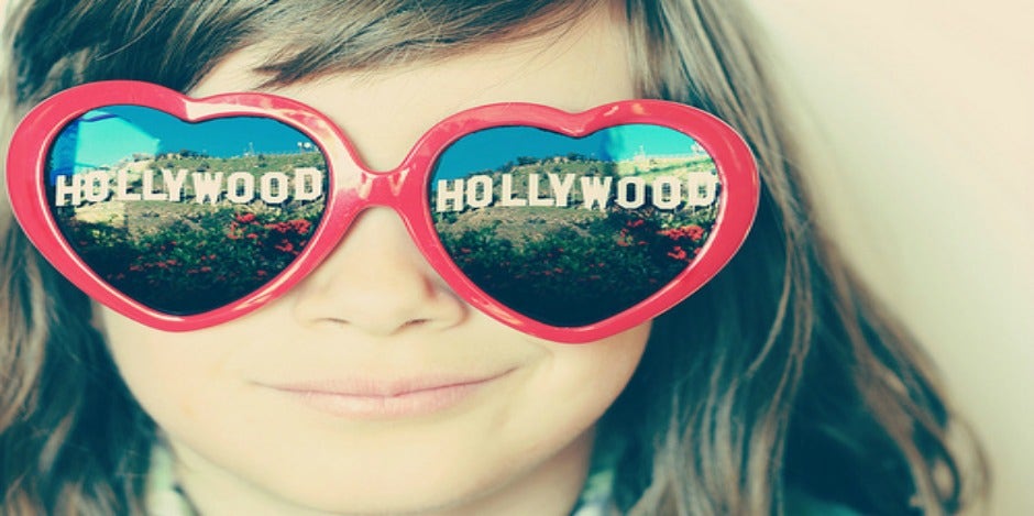 little girl admires hollywood stars