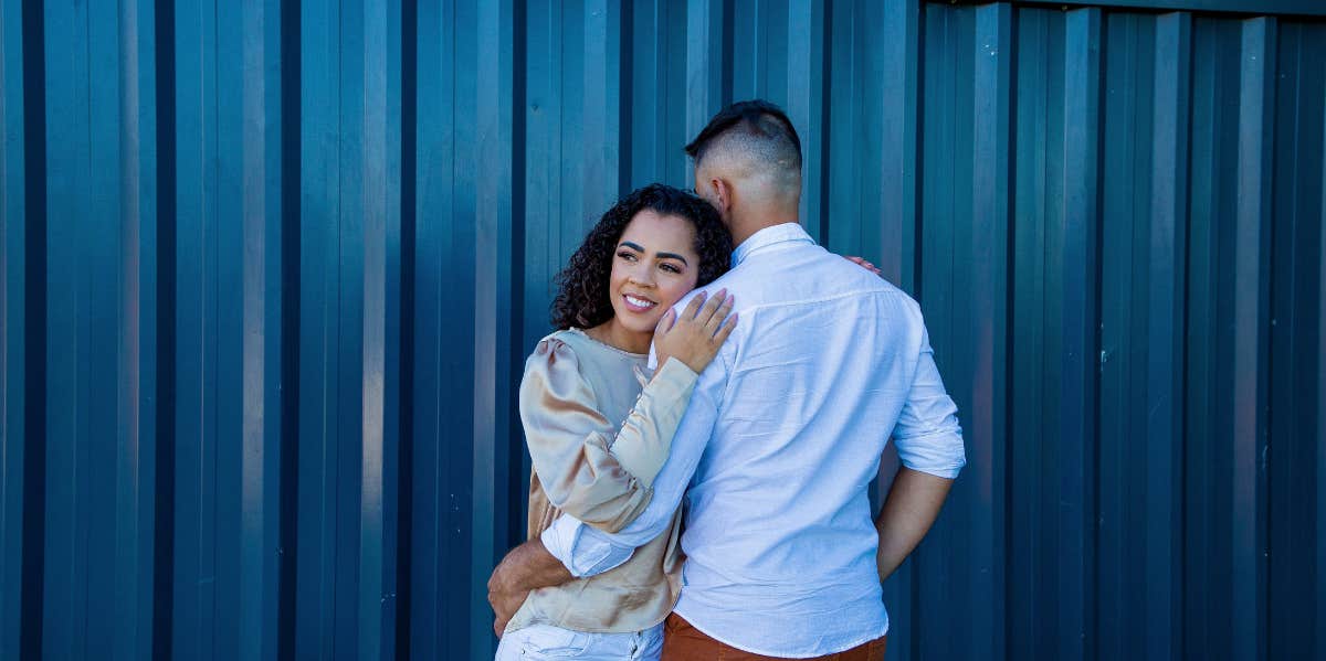 The Harsh Reason Why People Don't Want To Get Married Anymore hugging couple