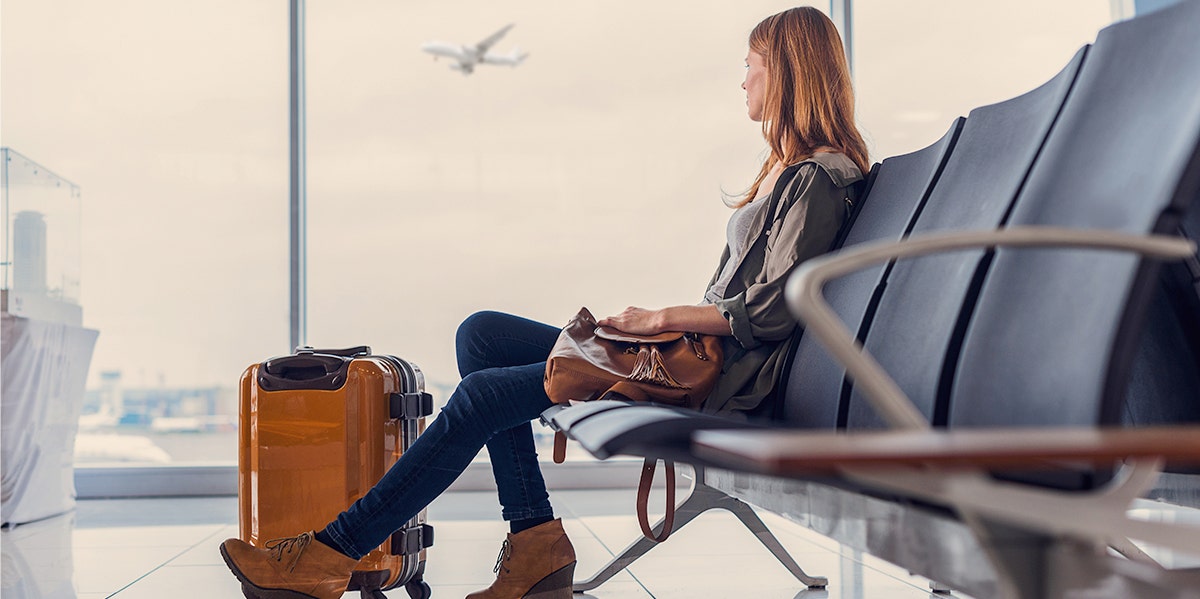 woman sitting at airport