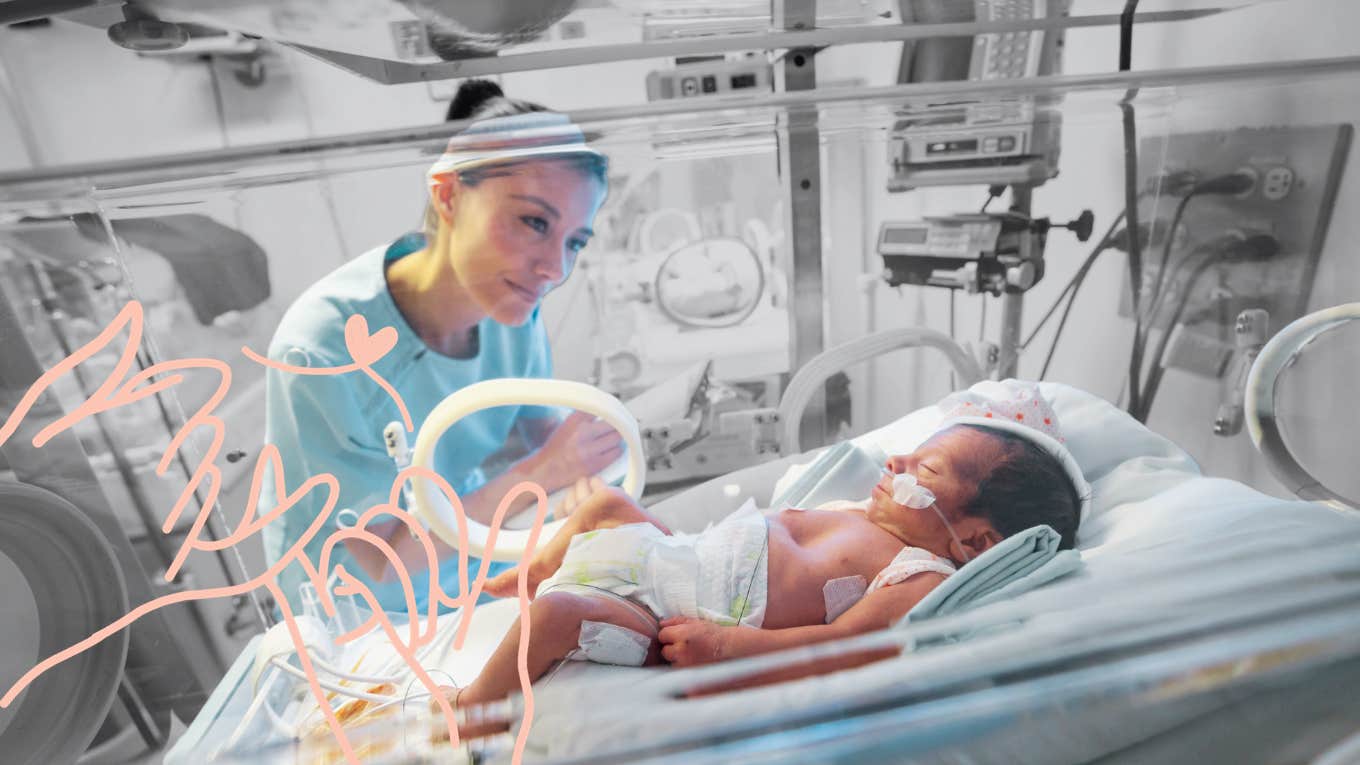 Mother looking over daughter in the NICU