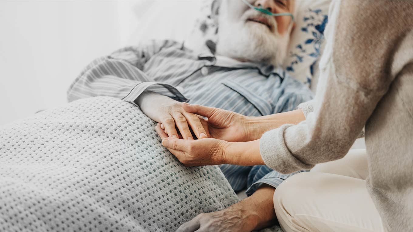 Old man in hospital bed