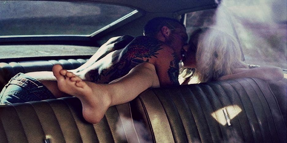 Having sex in a car Having sex in a car