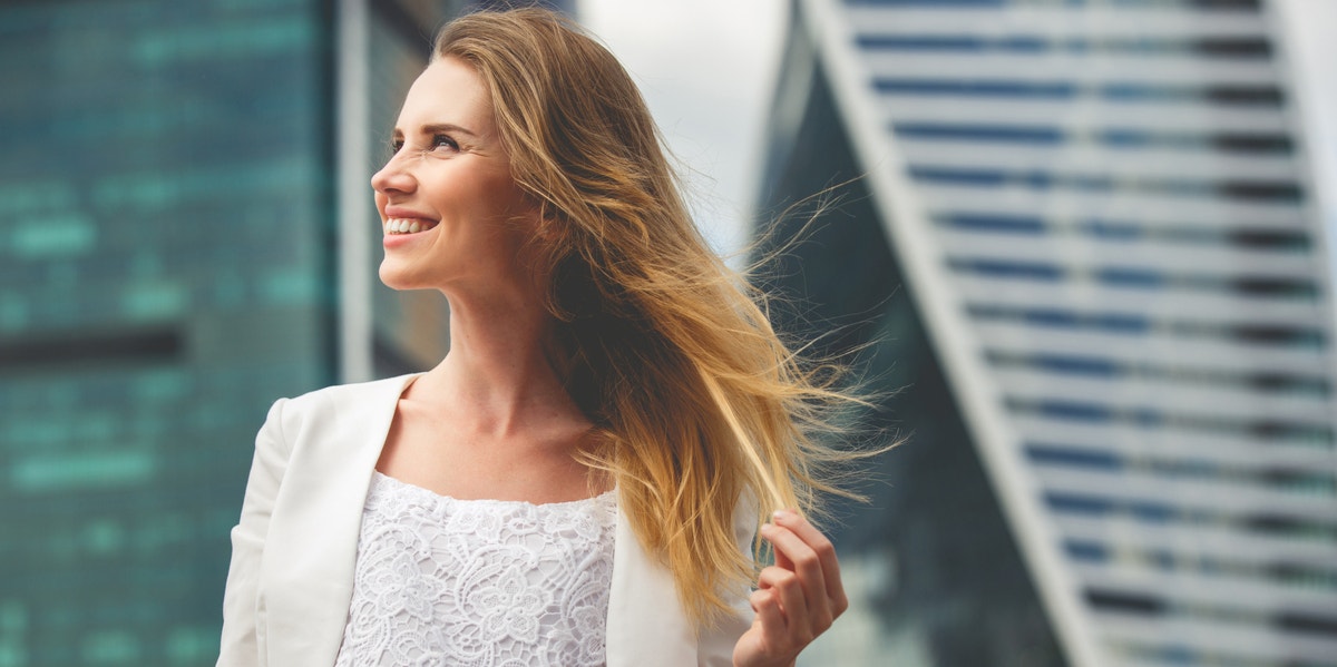 How You Can Become Someone You're Proud To Be confident woman smiling
