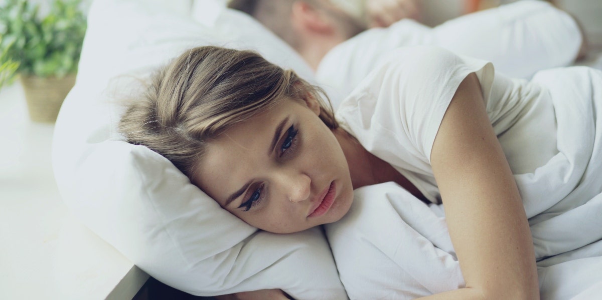 how body image issues affect your sex life sad woman in bed
