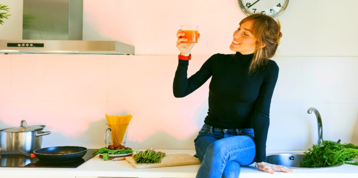 3 Tips On How To Boost Your Immune System For This Fall woman eating healthy in order to boost immune system