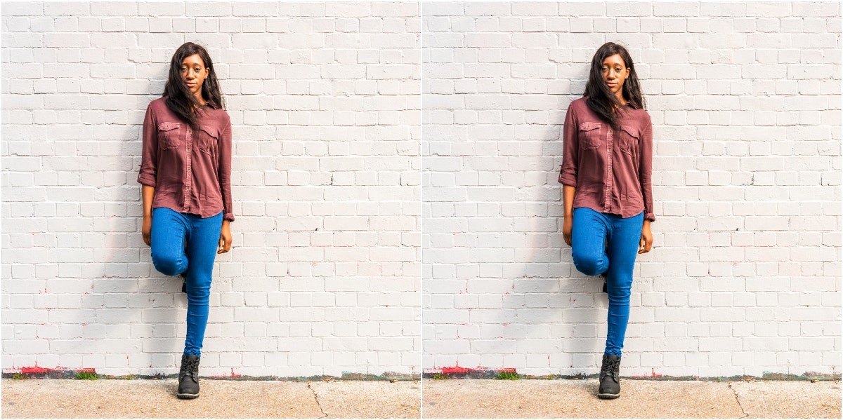 mirrored image of woman leaning against brick wall