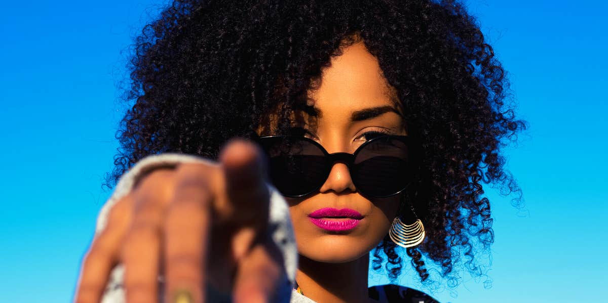 How To Deal With Arrogant People: 6 Tips & Comebacks woman wearing sunglasses