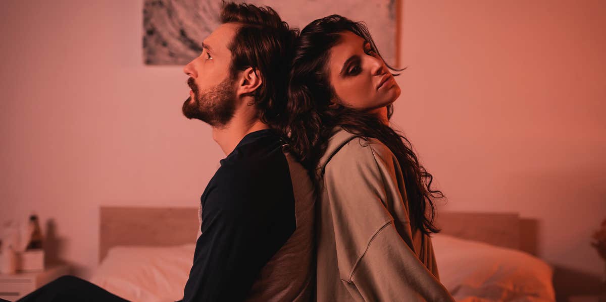 5 Signs Something Really Isn't Right In Your Relationship couple having problems sitting back to back