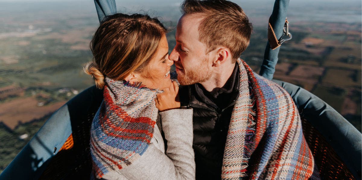 woman and man kissing