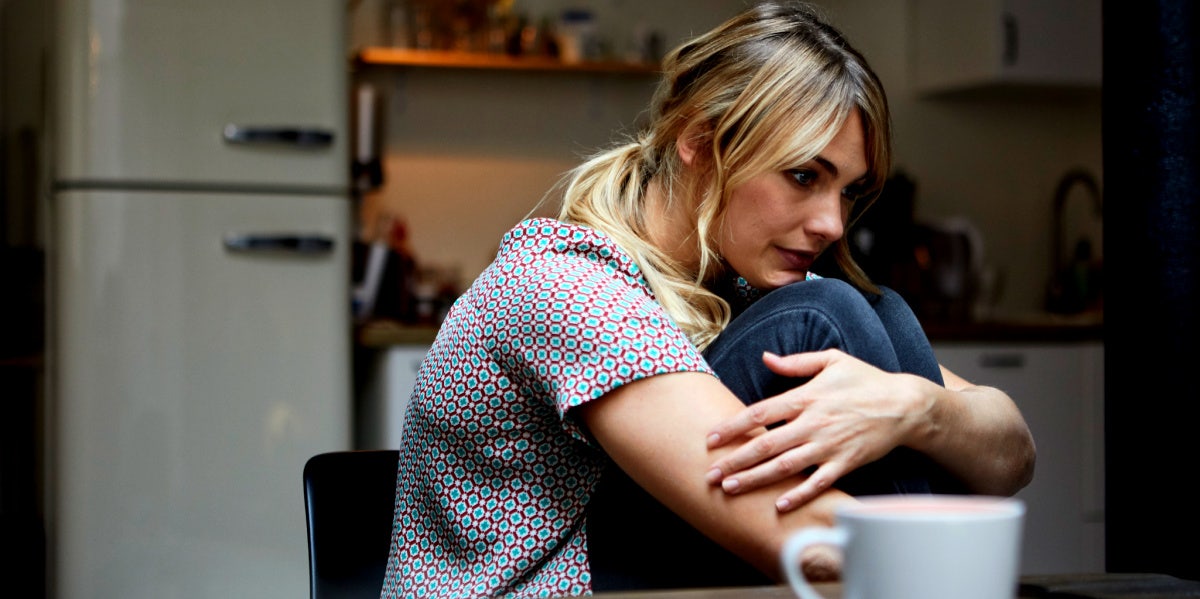 6 Ways An Emotionally Abusive Relationship Changes You woman in an emotionally abusive relationship