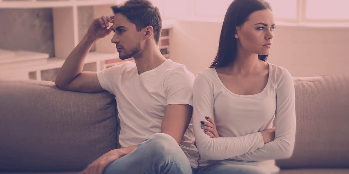 How To Fix A Broken Marriage (Before It Leads To Divorce) couple sitting on the couch, facing away from one another