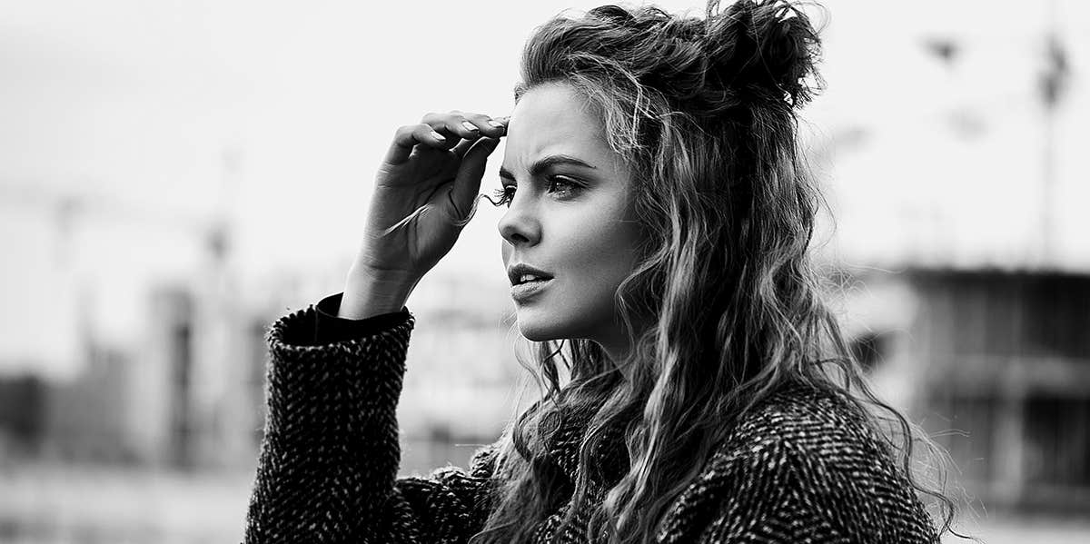 Tried-And-True Ways To Get Over Him (Or Get Him Back) Fast woman with bun in her hair