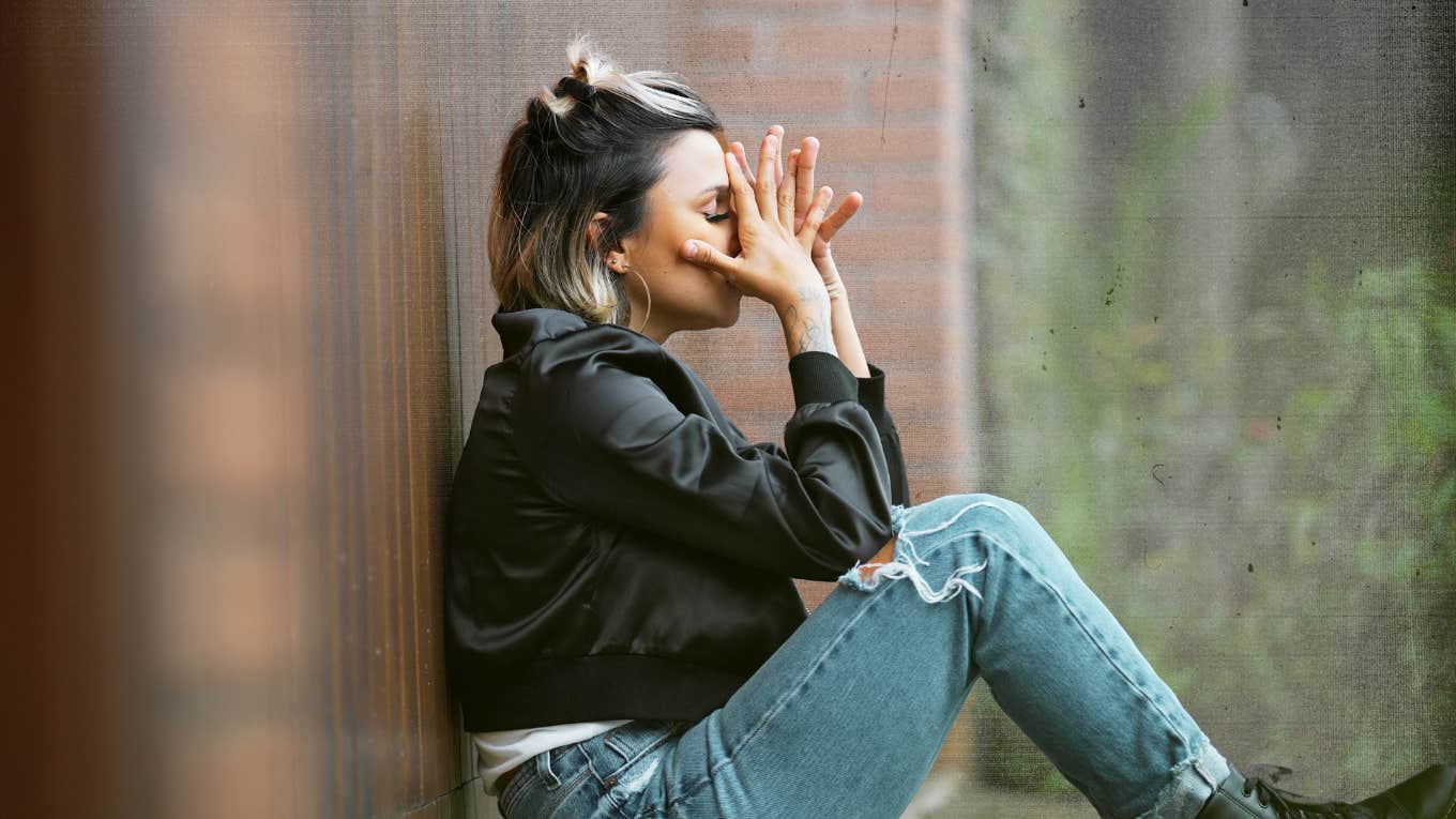 How To Heal Your Soul When You've Done Something You Regret Woman with hands on face, deep in regret