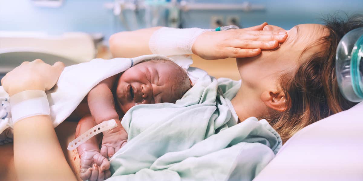 woman holding newborn