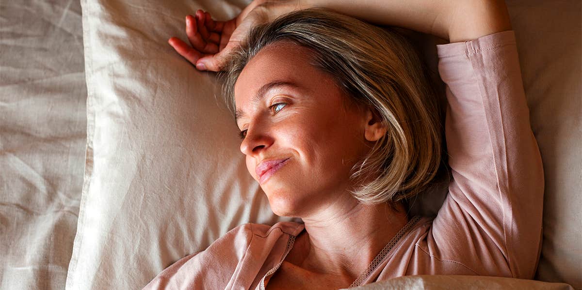 woman laying in bed