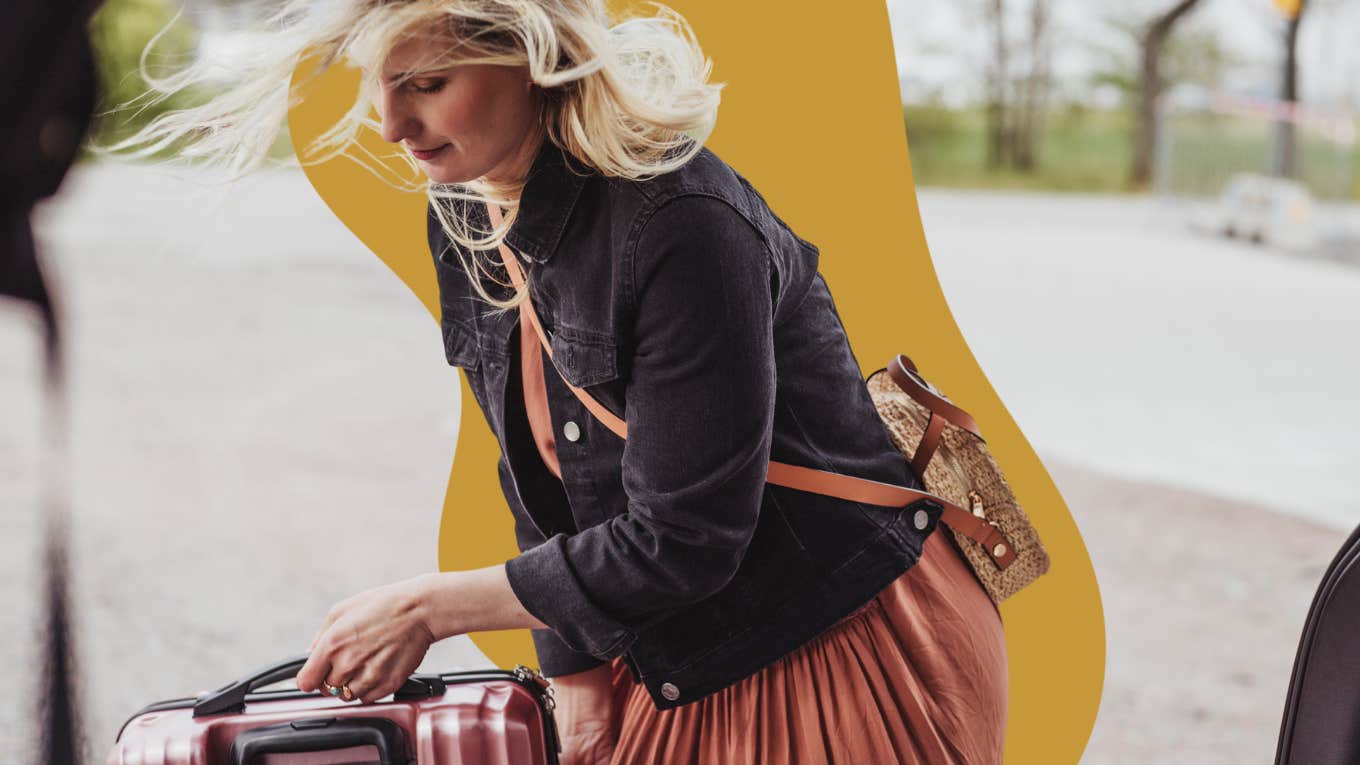 woman putting her bags into her car to leave