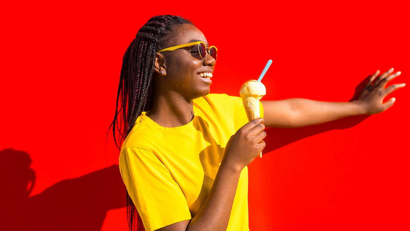 happy girl eating ice cream cone